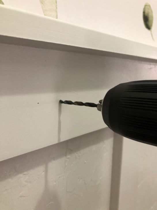 drillbit against wall